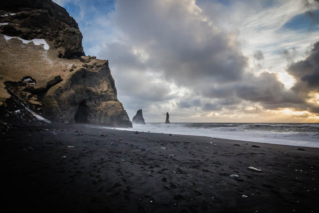 Exploring the Mystique of Black Sand Beaches: Nature’s Unique Wonders