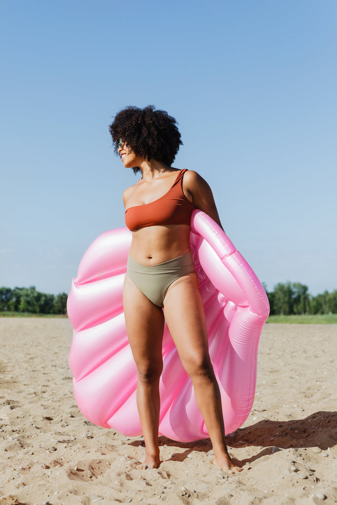 woman on beach in swimsuit